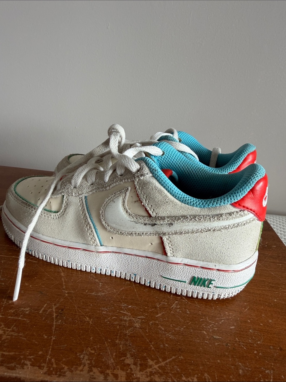 Nike Kids Off-White Sneakers with Teal Lining and Red Heel